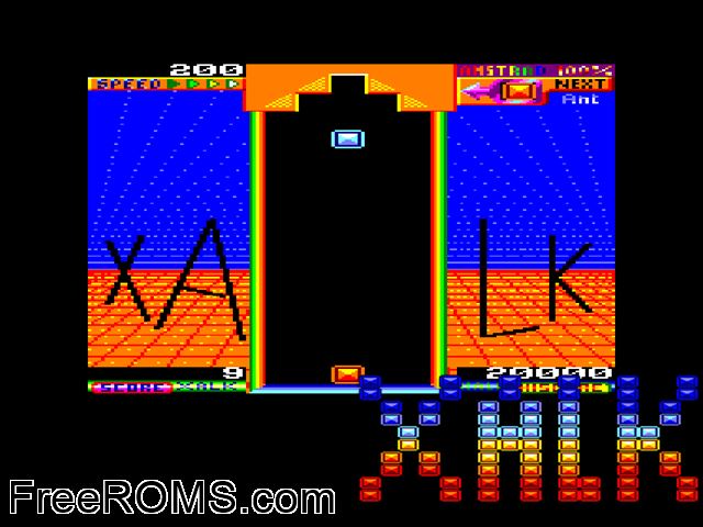Xalk (F) (1990) Amstrad CPC game showing 3D box cover and gameplay screenshot