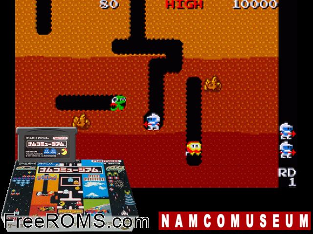 Namco Museum (Japan) Gameboy Advance game showing 3D box cover and gameplay screenshot