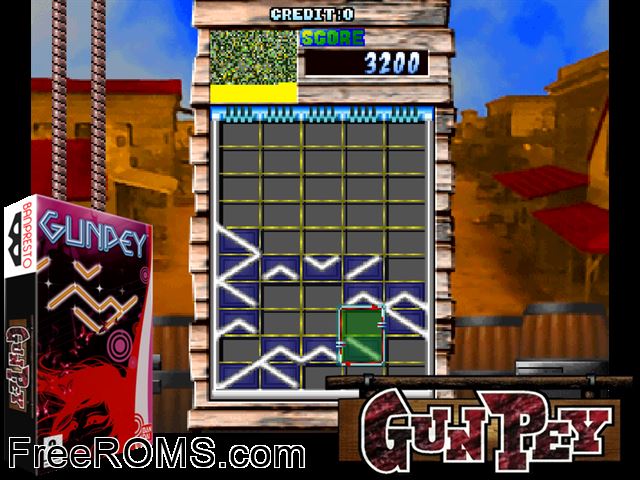Gunpey MAME game showing 3D box cover and gameplay screenshot